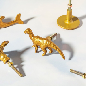 Deurknop dinosaurus goud Sass & Belle