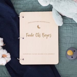 Gepersonaliseerd babyboek met icoontje liggend